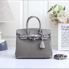 Hermès Birkin , specifically a Grizzly Birkin(FTCA050KK)