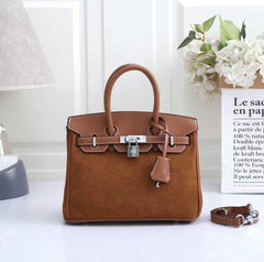 Hermès Birkin , specifically a Grizzly Birkin(FTCA050KK)