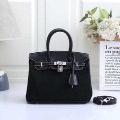 Hermès Birkin , specifically a Grizzly Birkin(FTCA050KK)