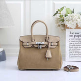 Hermès Birkin , specifically a Grizzly Birkin(FTCA050KK)