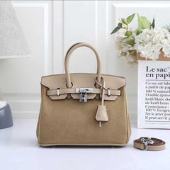 Hermès Birkin , specifically a Grizzly Birkin(FTCA050KK)